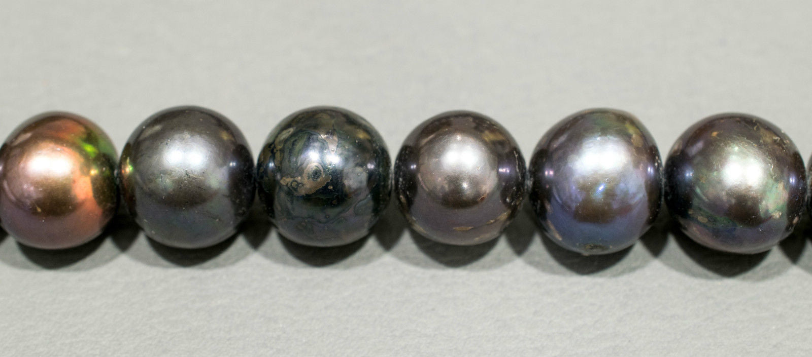 Perlenstrang Silber rund mit hohem Lüster in 14 mm